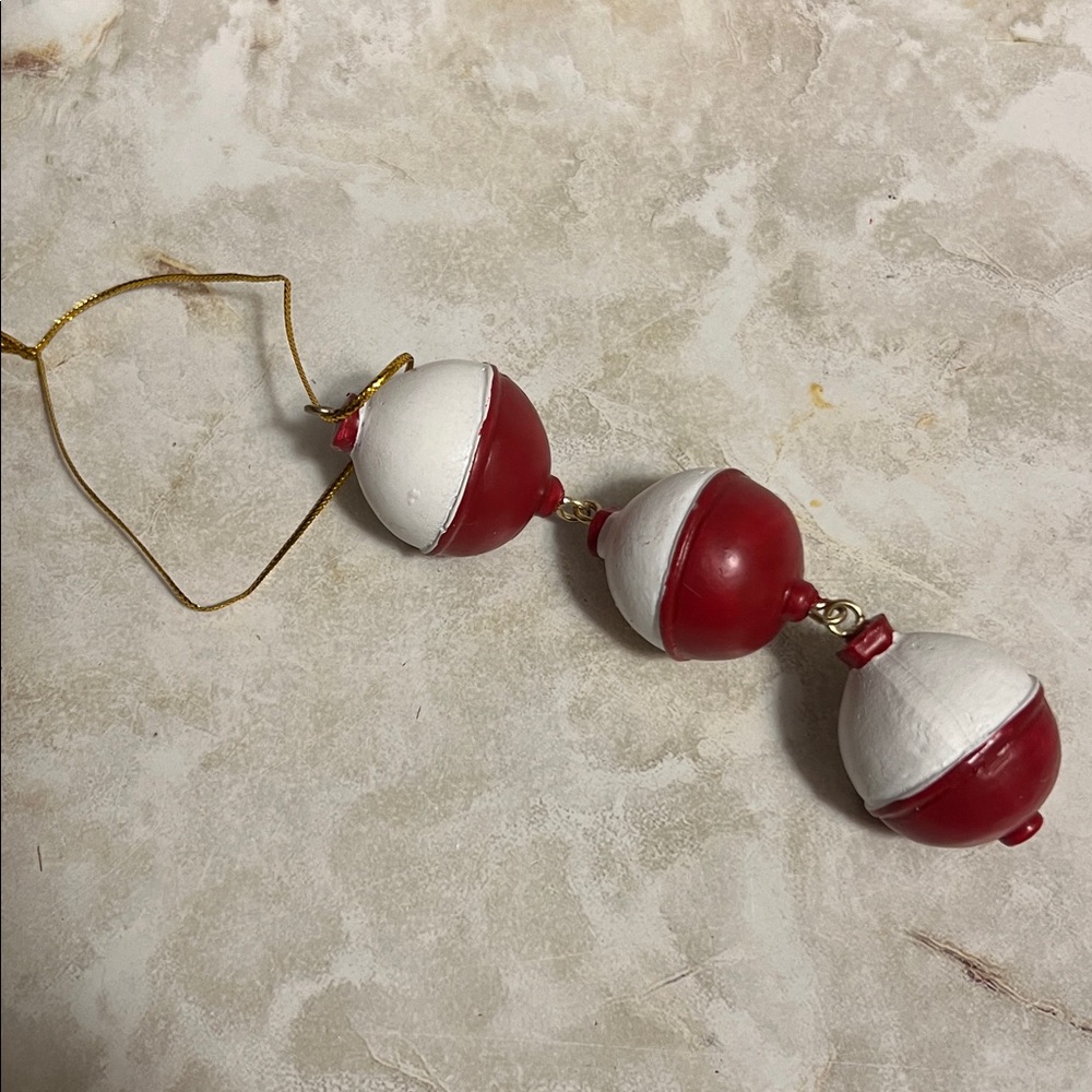 Christmas tree ornament string of 3 fishing bobbers. Fisherman